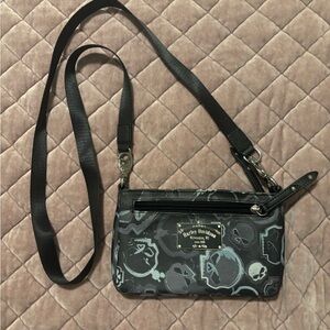 Harley  Davidson Black and Gray Crossbody Bag with Skulls. In great shape.